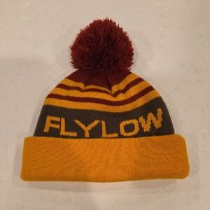 Flylow Women's Striped Pom-Pom Beanie - Brown and Yellow